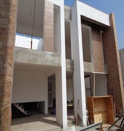 Construcción de Vivienda de 2 Pisos